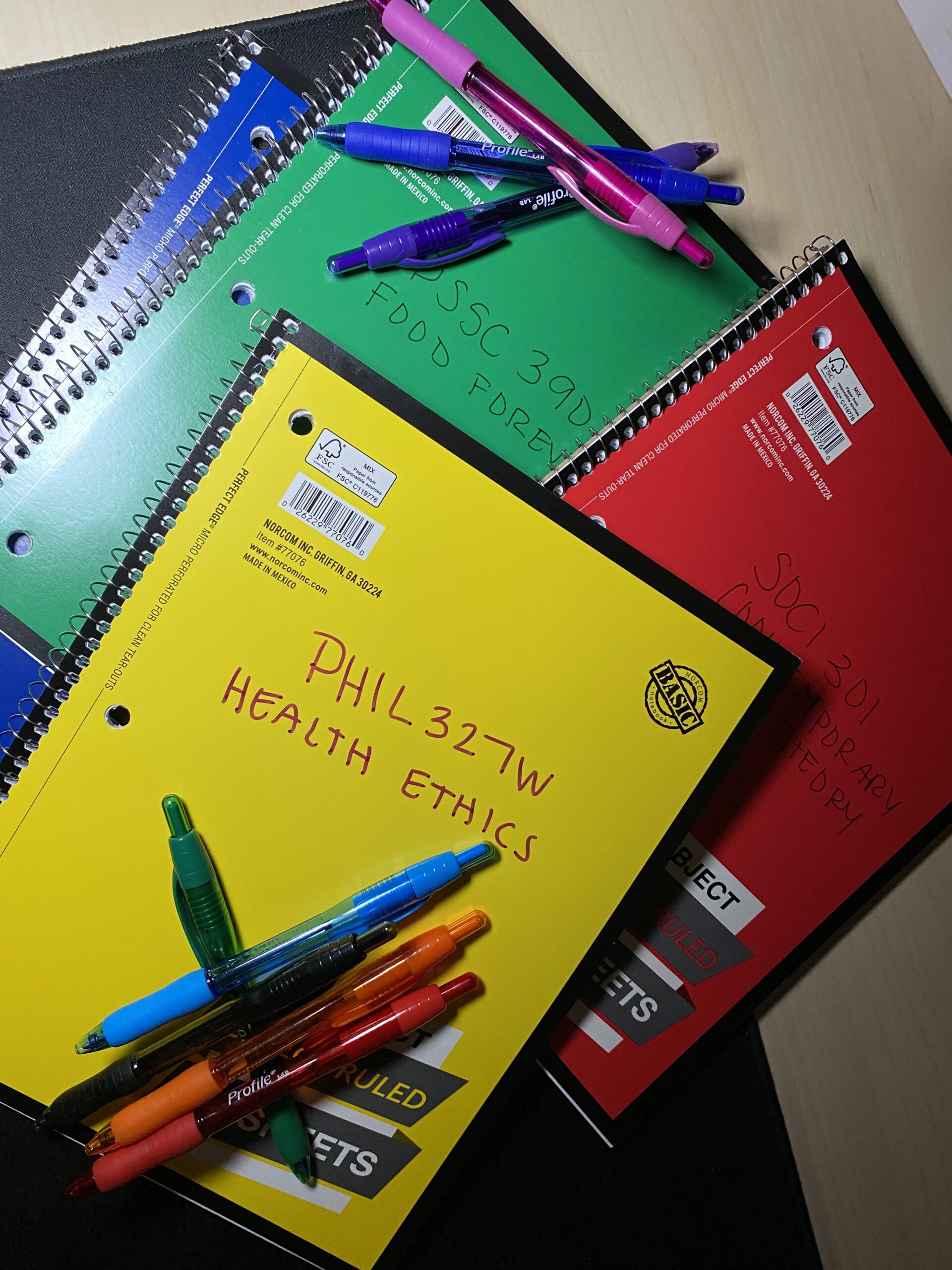 class notebooks, colored pens